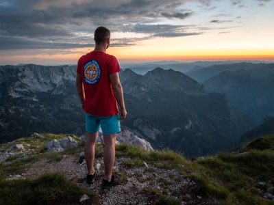 Man standing on the top of highest peak of Bosnia and Herzegovina Maglic